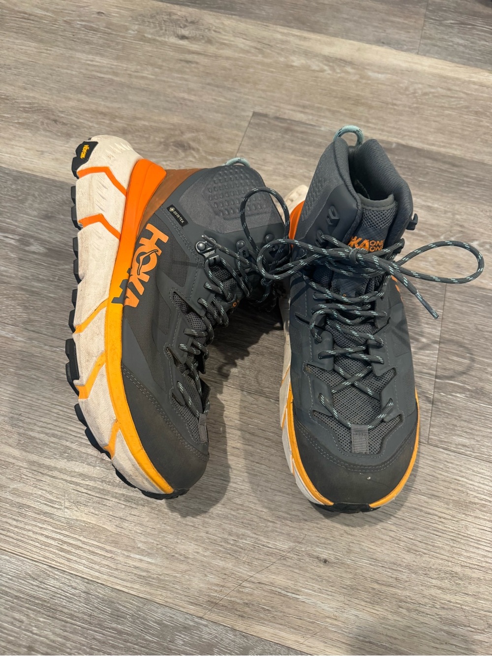 Hoka OnTenNine Hike GTX hiking boots in the Castlerock/Persimmon Orange colorway